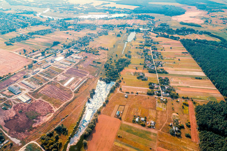 Rural landscape. View from above of countryside in autumn. Aerial view of village and arable fields...