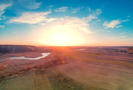 Sunset over the countryside. Rural landscape in autumn. Aerial view