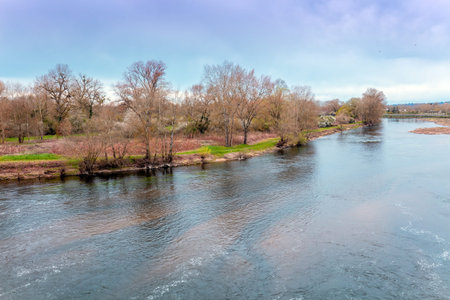 Rural landscape. River in early spring. Beautiful nature. Laura river, Digoin, Franceの写真素材