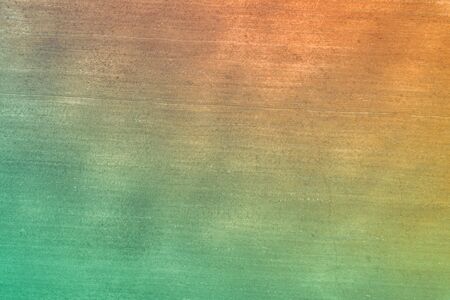 Soil texture background. A plowed field in early spring. Colorful land surface. Gradient color. Top viewの写真素材