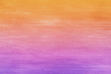 Soil texture background. A plowed field in early spring. Colorful land surface. Gradient color. Top...