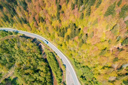 Aerial view of the mountain highway in spring. Beautiful skyview landscape. Carpathian mountains. Ukraineの写真素材