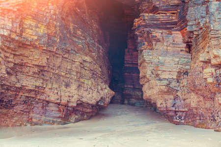 Rocky sea coast at sunrise. Beach Playa de Las Catedrales in Ribadeo, Spain, Europeの写真素材