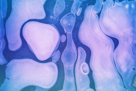 Natural abstract pattern on a frozen puddle. Artistic colorful nature background