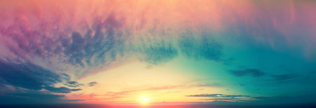 Panorama of a colorful cloudy sky at sunset. Gradient color. Sky texture. Abstract nature background
