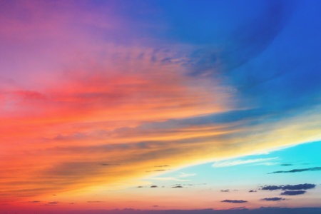 Colorful cloudy sky at sunset. Gradient color. Sky texture. Abstract nature backgroundの写真素材
