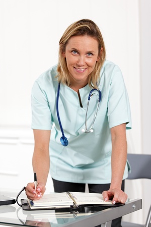 doctor woman with penの写真素材