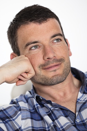 beautiful man relax on sofa at homeの写真素材