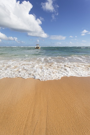 carabean beach and boat on the seaの写真素材