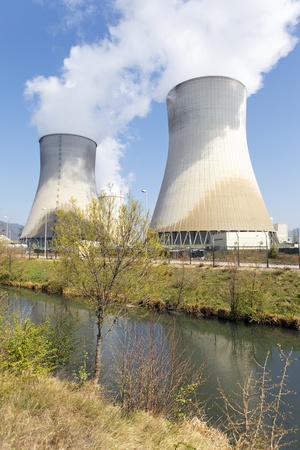 smokestacks of nuclear factory and river in summerのeditorial素材
