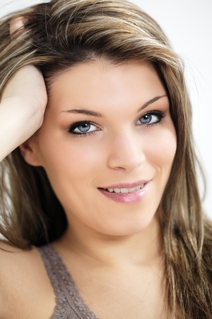 portrait of beautiful blond woman with blue eyesの写真素材