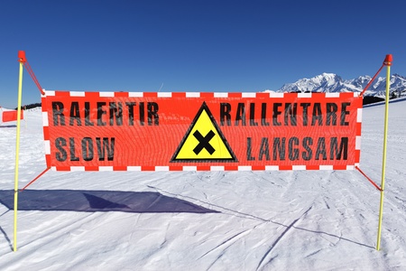 danger panel on ski track in winterの写真素材