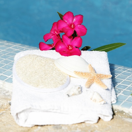 Spa setting with flower and white towelの写真素材