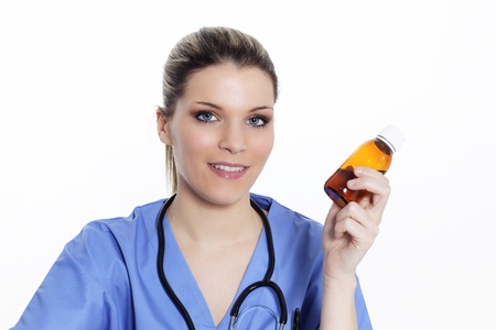 woman doctor with medicine bottle in the handの写真素材