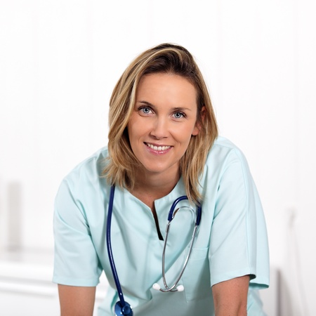 portrait of blond woman doctor in hospitalの写真素材