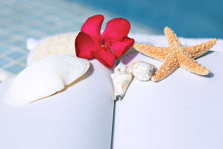 Spa setting with flower and white pageの写真素材