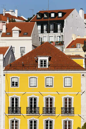 facades of different colored houses in Lisbon の写真素材
