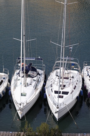 two boats in harbor on mediterranean seaの写真素材