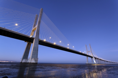 famous Vasco da Gama bridge in Lisbon by night, Portugal の写真素材