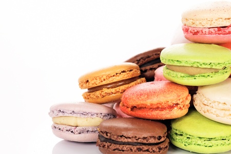 colorful macaroons assortment isolated on white background の写真素材