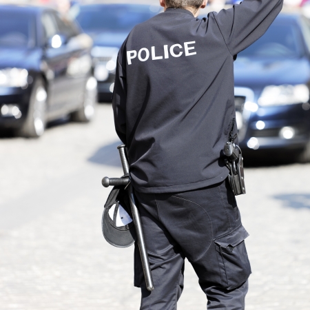 Police officer making the stop signのeditorial素材