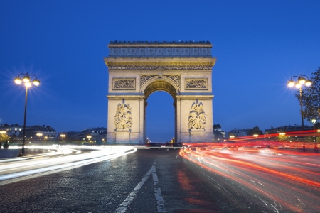 The famous Arc de Triomphe by night, Paris France のeditorial素材