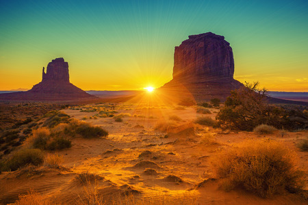 Sunset at the sisters in Monument Valley, USAの写真素材