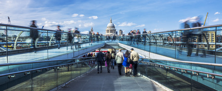 the Millennium footbridge looking towards St. Paul's Cathedral, panoramic view.のeditorial素材