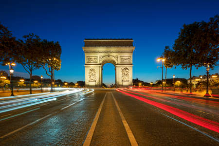 Famous Arc de Triomphe at night, Paris, France.の写真素材