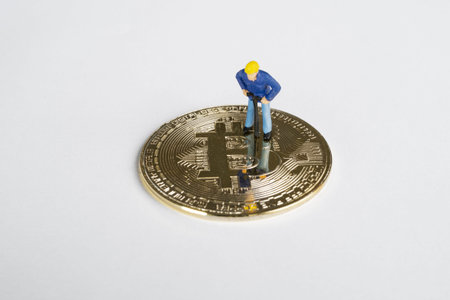 macro miner figures working on bitcoin. virtual cryptocurrency mining concept