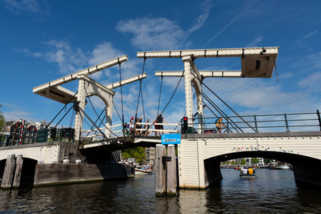 AMSTERDAM, NETHERLANDS - AUGUST 23 2022, Famous Magere Brug bridge in Amsterdamのeditorial素材