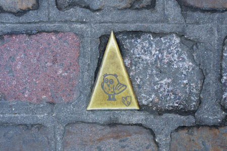 Dijon, France - Febuary 12, 2023: famous plaque on the ground in the street to indicate to tourists the monuments of the city, Dijon, France.のeditorial素材