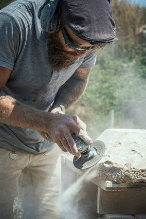Stonecutter at work outdoor, Franceの写真素材