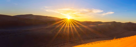 sunset on the dunes of Merzouga, Moroccoの写真素材