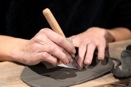potter woman hands at work in Franceの写真素材