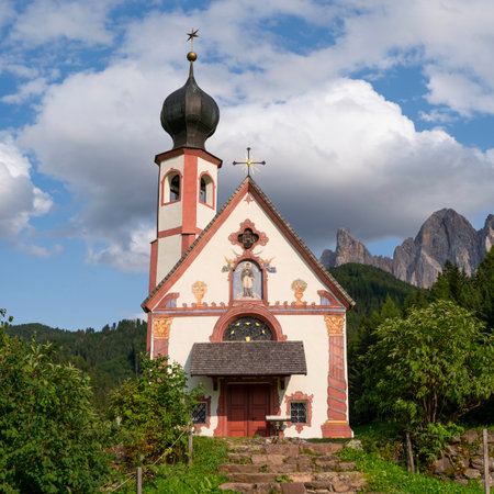 St. John church in front of the Odle mountains, Funes Valley, Dolomites, Italyの写真素材