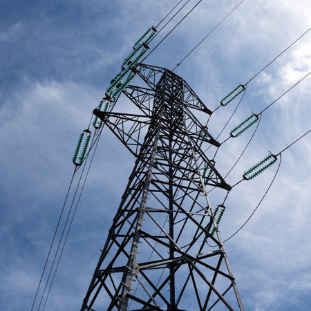 electric pylon blue sky in background, Franceの写真素材