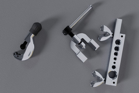 rolling and pipe cutter on a gray background 3d