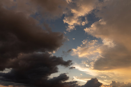 Cloudscape, Colored Clouds at Sunset near the Ocean in a Tropical Climateの写真素材