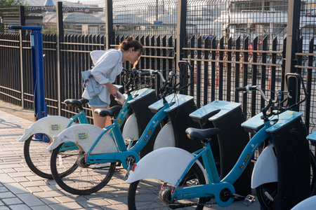ISTANBUL, TURKEY - MAY 22, 2022: Public parking of rental bicycles in the city.のeditorial素材