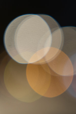 Colourful festive multi-colored circles . Defocused abstract multicolored bokeh lights background.の写真素材