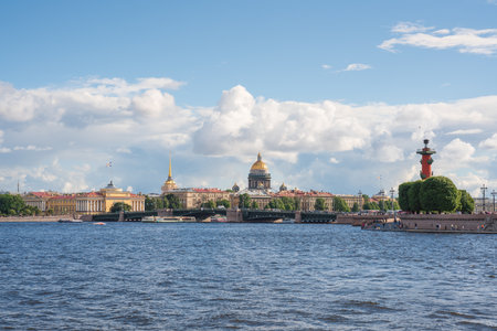 St. Petersburg. A beautiful panoramic view from the Neva River to the Palace Bridge, the spire of the Admiralty, the dome of St. Isaacs Cathedral and the Rostral Column on a sunny bright summer day.の写真素材