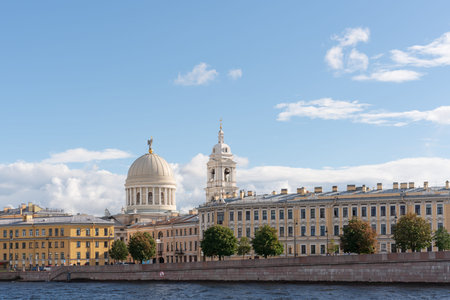 View from a boat to the Makarova Embankment and the Church of the Holy Great Martyr Catherine in St....