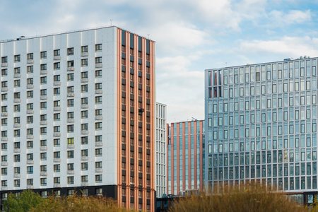 Modern residential buildings in the city under the blue sky on a clear day. Construction industry....