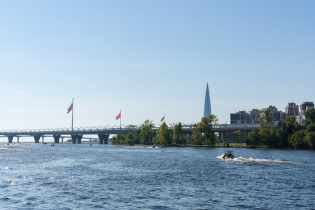 Cityscape of modern Saint Petersburg on a sunny summer day. View from Elaginov Island to the Lakhta Center skyscraper and the Imperial Yacht Club on the Srednyaya Nevka River. High quality photoの写真素材