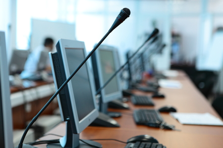 Computer keyboard and gadgets in the workplace in a computer labの写真素材
