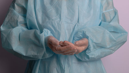 Medical worker holding a syringe with medicineの写真素材
