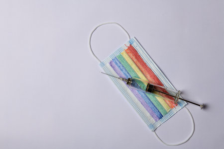 LGBT flag syringe and virus vaccine will save the worldの写真素材