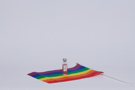 LGBT flag syringe and virus vaccine will save the worldの写真素材