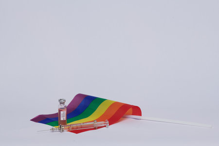 LGBT flag syringe and virus vaccine will save the world